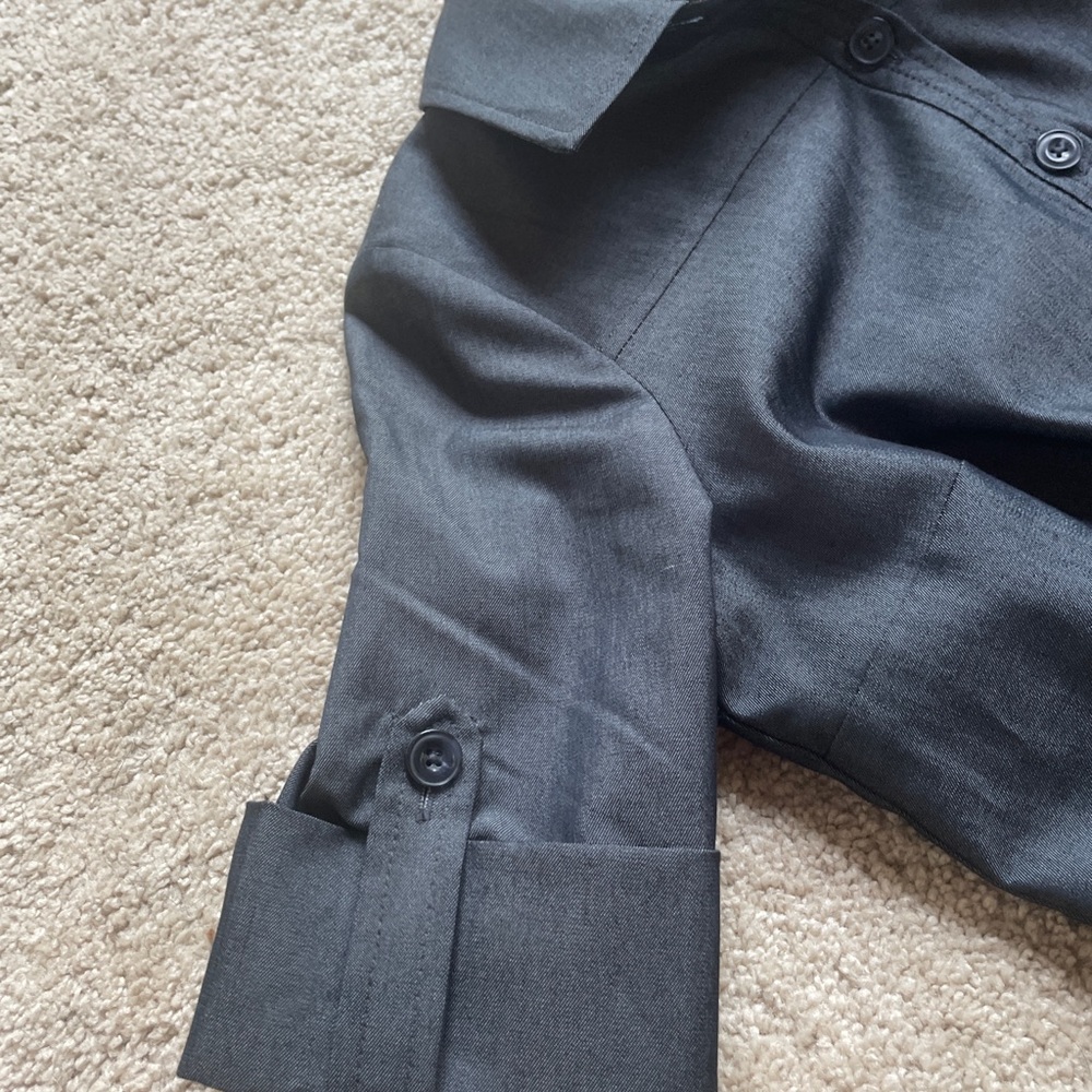 Liz Claiborne. Dark blue denim in color.